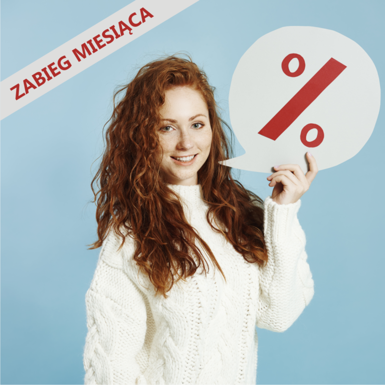 Uśmiechnięta kobieta trzyma w ręce symbol procentów. W lewym gornym rogu napis Zabieg Miesiąca.